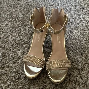 Gold high heels